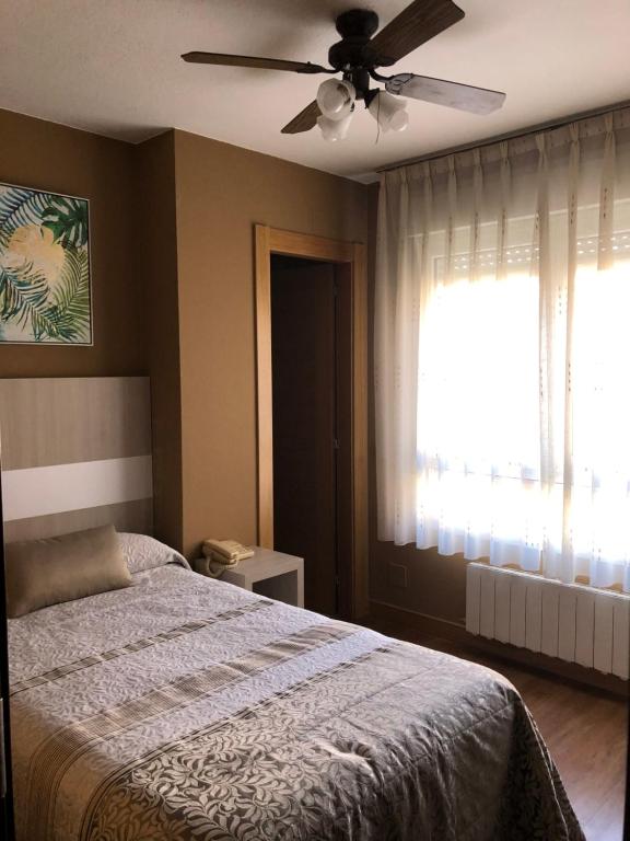 Postel nebo postele na pokoji v ubytování Hotel Bahia