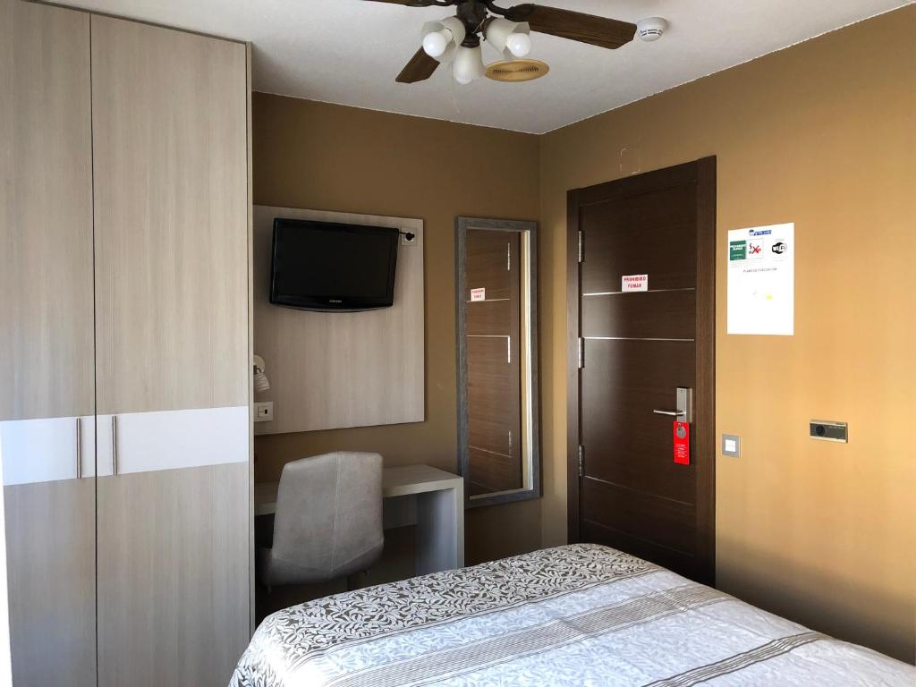 Postel nebo postele na pokoji v ubytování Hotel Bahia