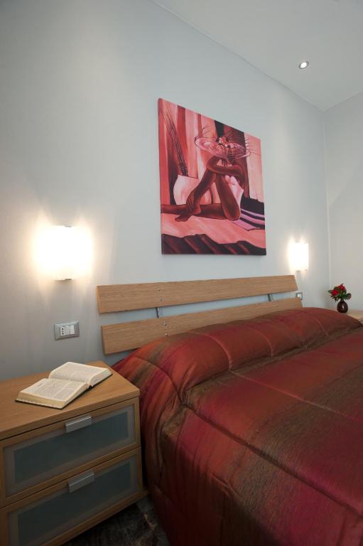 Postel nebo postele na pokoji v ubytování Affittacamere Da Paulin