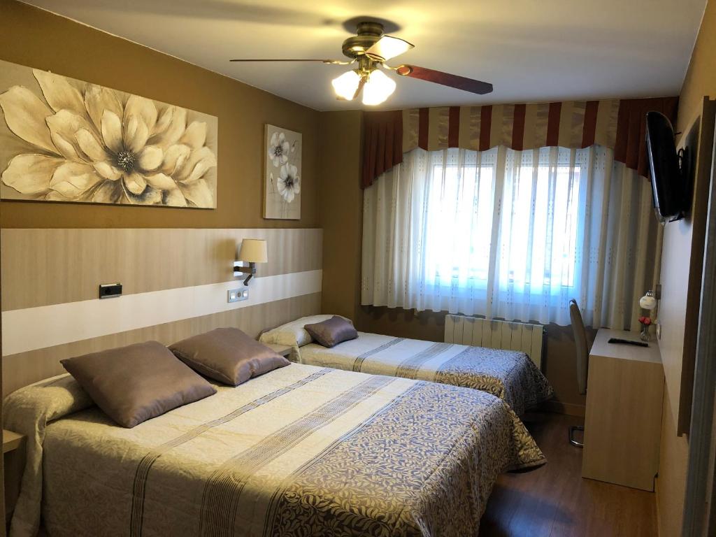 Postel nebo postele na pokoji v ubytování Hotel Bahia