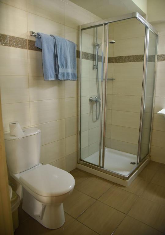 Koupelna v ubytování Elysso Hotel