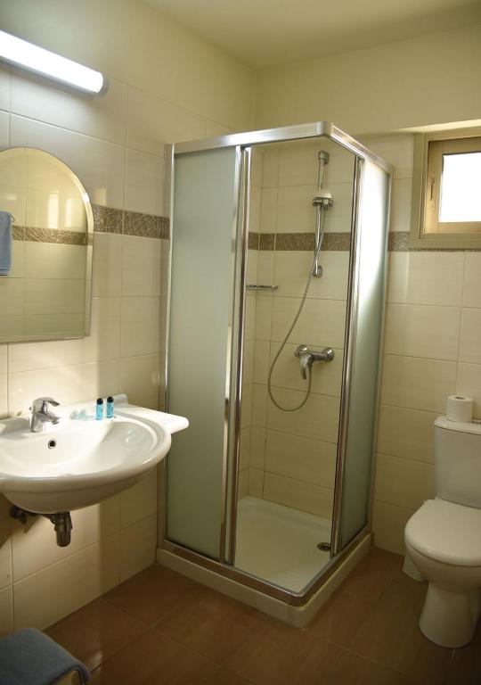 Koupelna v ubytování Elysso Hotel