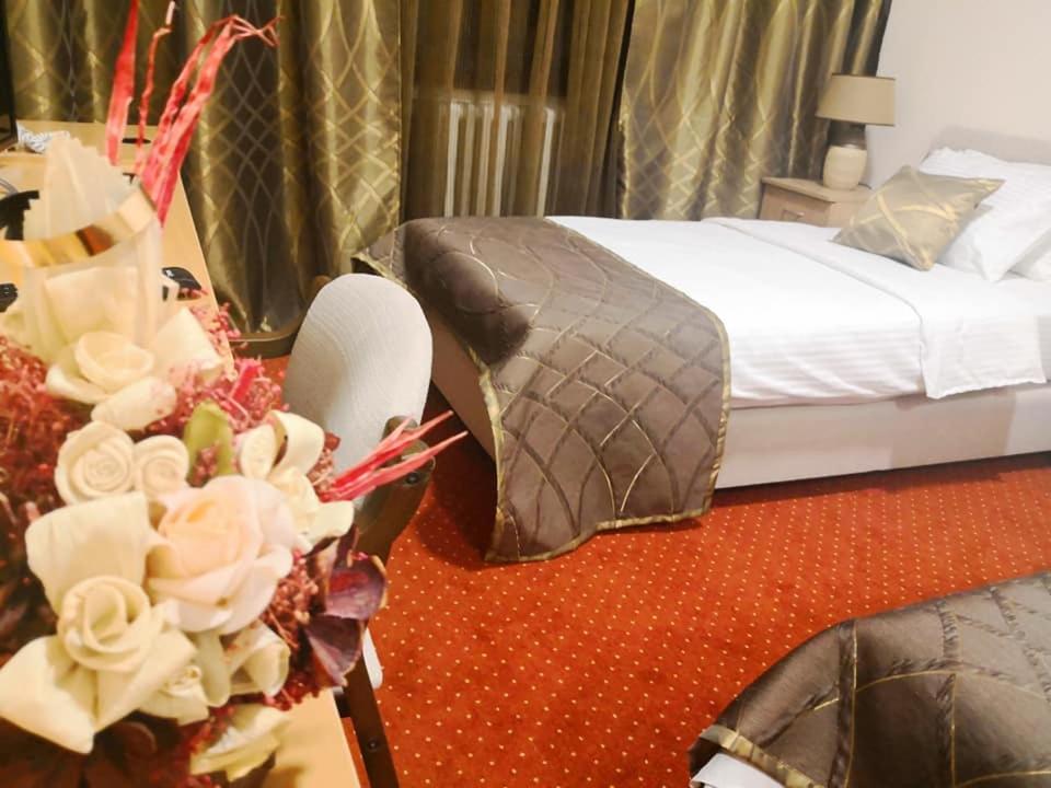 Postel nebo postele na pokoji v ubytování Hotel N