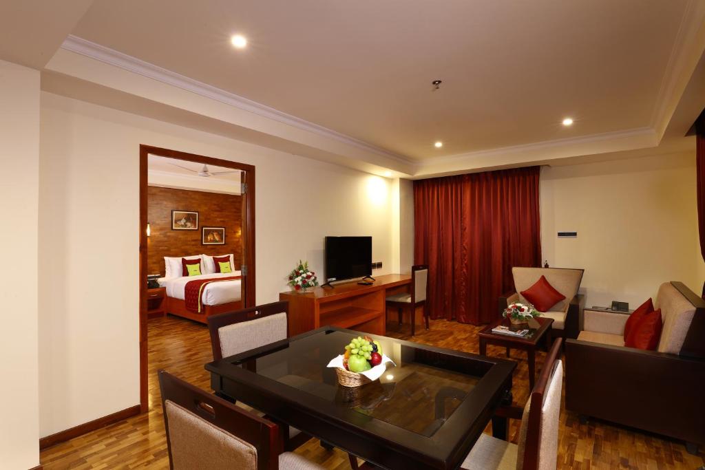 TV a/nebo společenská místnost v ubytování JVK Park Hotel