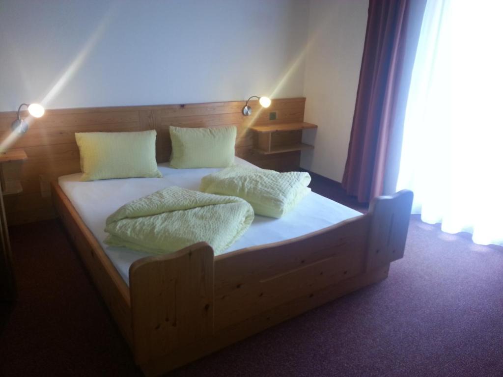 Postel nebo postele na pokoji v ubytování Haus Karwendelblick