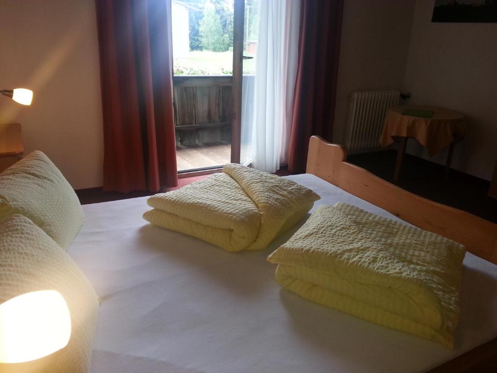 Postel nebo postele na pokoji v ubytování Haus Karwendelblick
