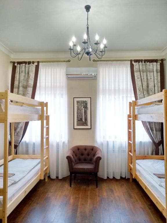 Postel nebo postele na pokoji v ubytování Belokorichi