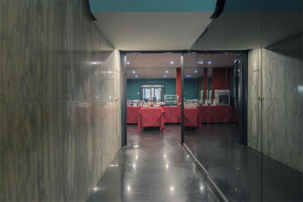 Postel nebo postele na pokoji v ubytování Executive Business Hotel
