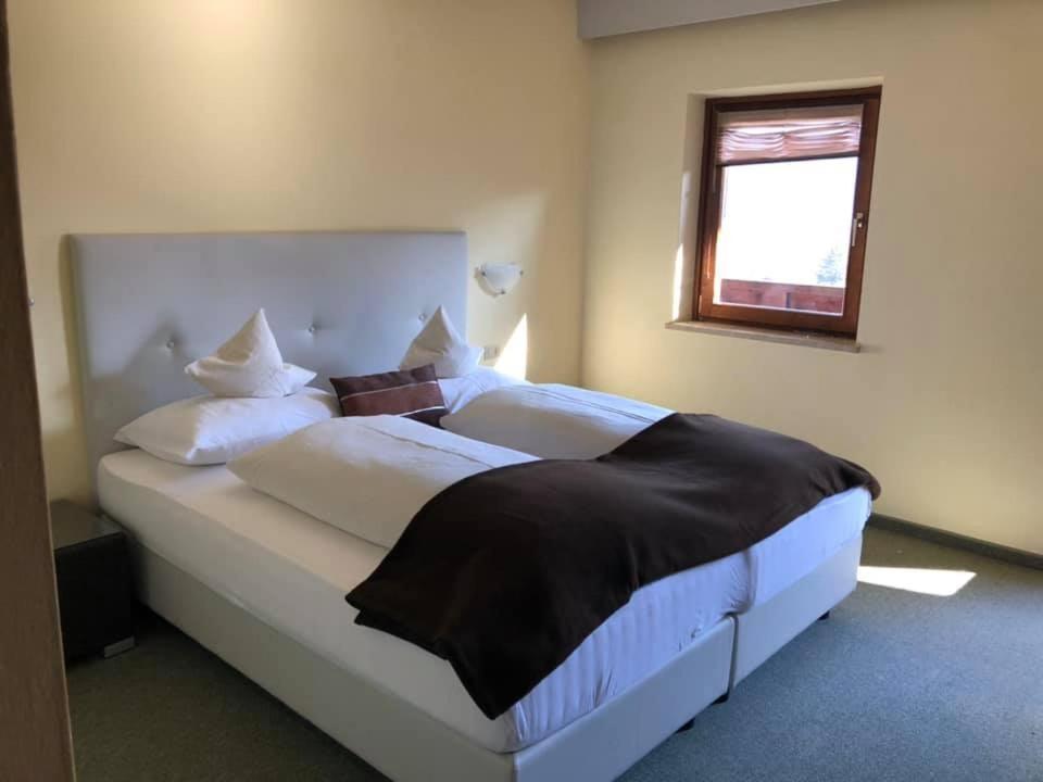 Postel nebo postele na pokoji v ubytování Hotel & Appartement Valtnaungut