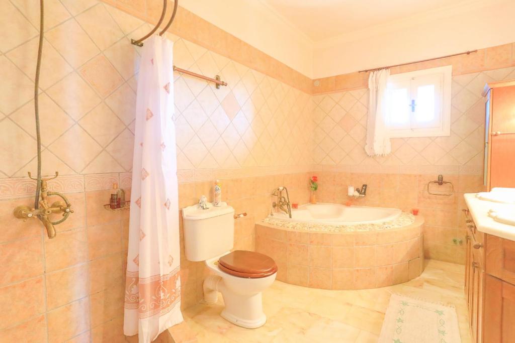 Koupelna v ubytování Villa Eftihia