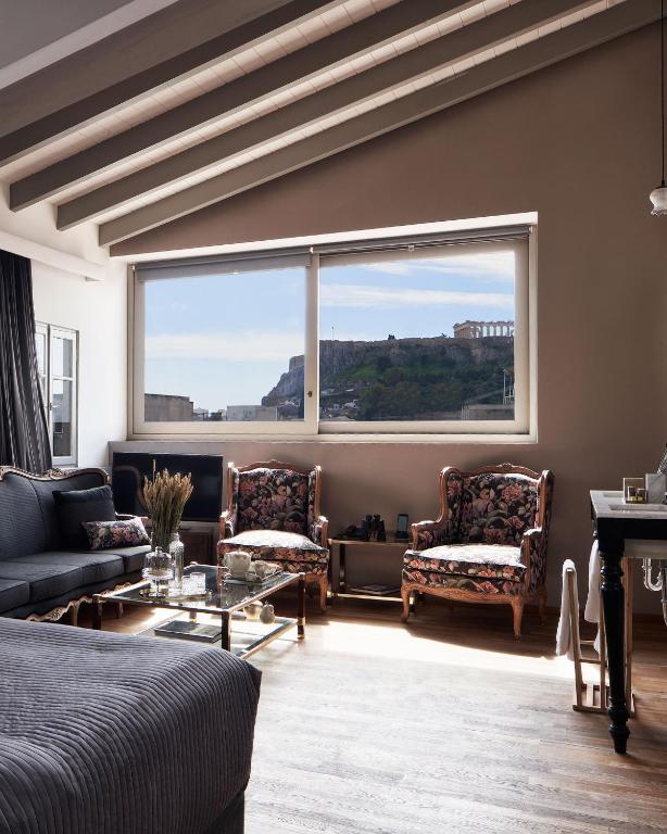 A seating area at Emporikon Athens Hotel