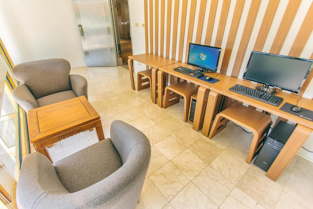 TV a/nebo společenská místnost v ubytování Foung Jia Hotel