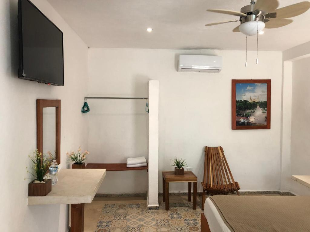 TV a/nebo společenská místnost v ubytování Hotel Casa Bamboo