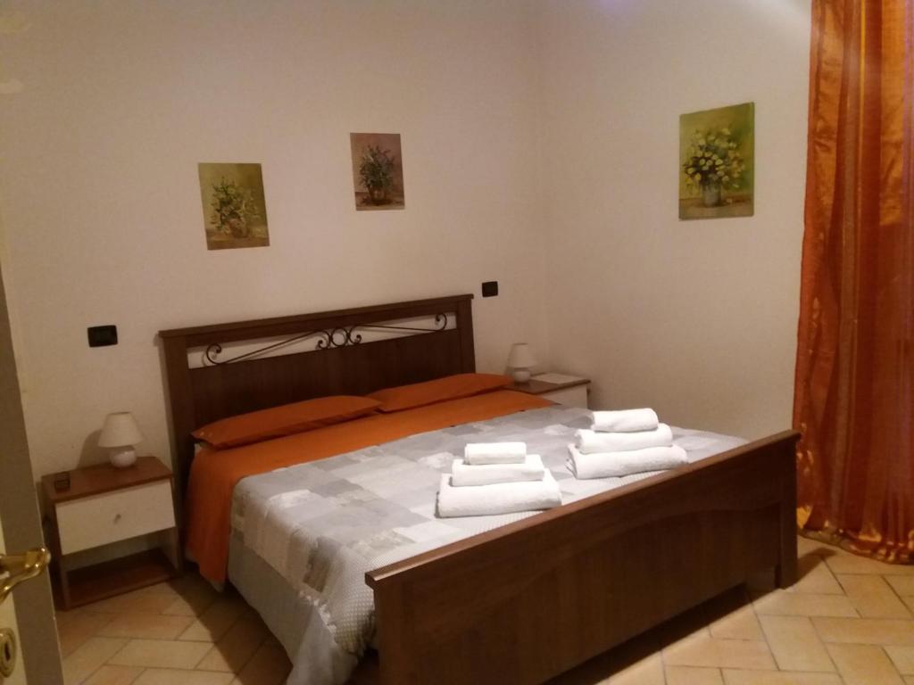 Łóżko lub łóżka w pokoju w obiekcie B&B Smile
