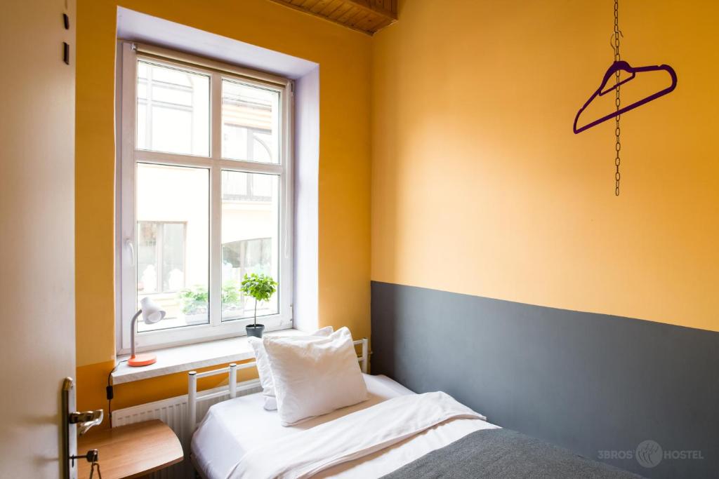 Postel nebo postele na pokoji v ubytování 3 Bros' Hostel Cieszyn