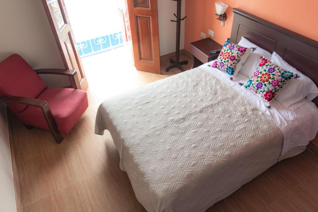Postel nebo postele na pokoji v ubytování Hospedaje Zaragoza