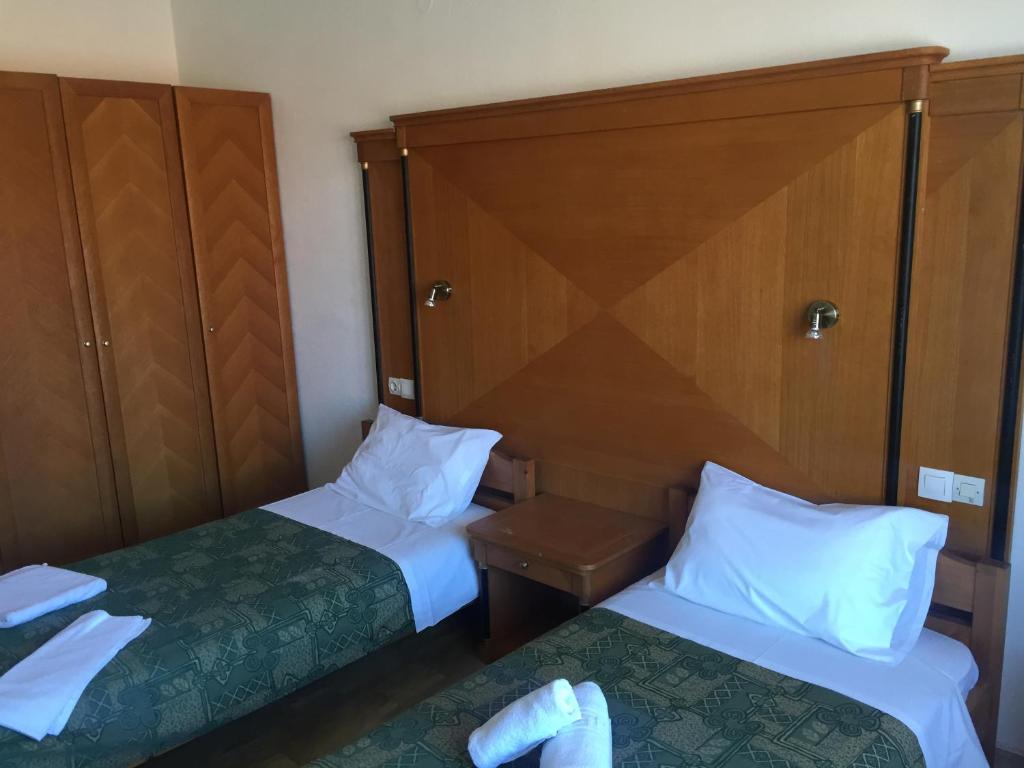 Postel nebo postele na pokoji v ubytování Diamond Beach Apts & Studios