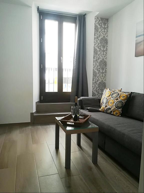 Posezení v ubytování Puerta Alameda Suites
