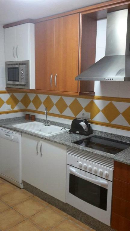 Kuchyň nebo kuchyňský kout v ubytování Villas Alandalus