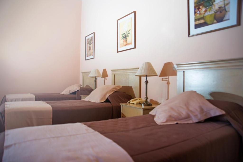 Säng eller sängar i ett rum på Posada del Frayle Bentos