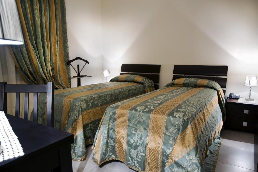 Postel nebo postele na pokoji v ubytování B&B Lepanto