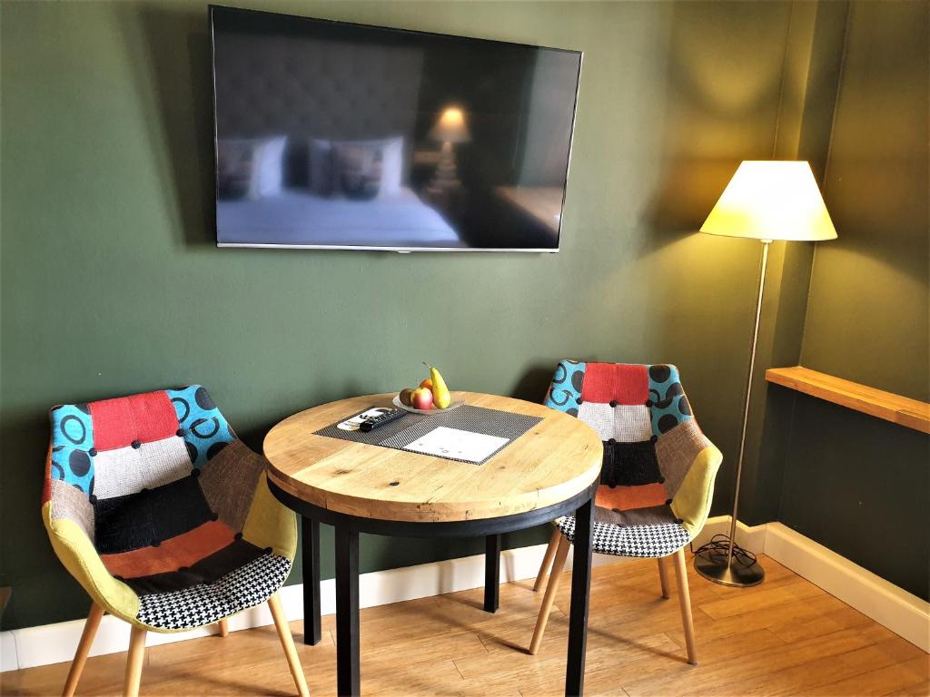 TV a/nebo společenská místnost v ubytování SleepWell Apartments Ordynacka