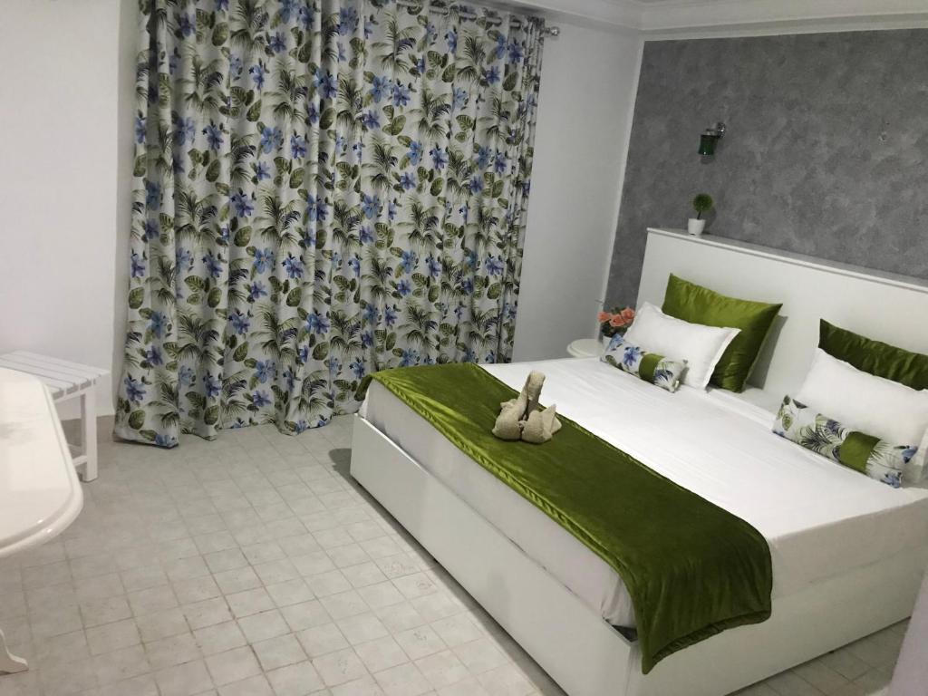 Postel nebo postele na pokoji v ubytování Appartement Touta écologique familial