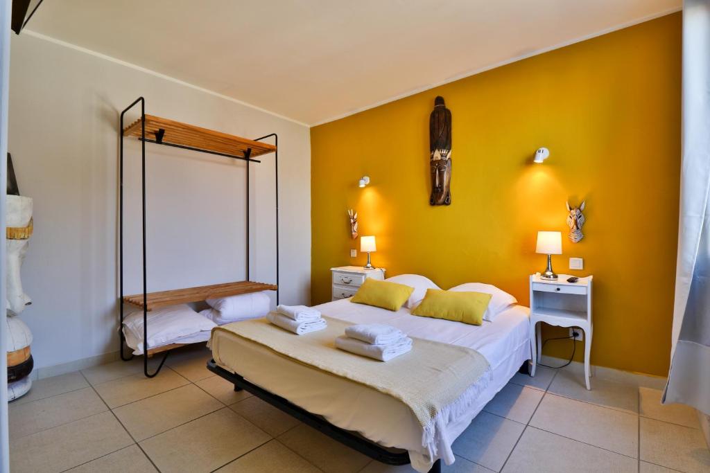 Postel nebo postele na pokoji v ubytování Hôtel La Bastide