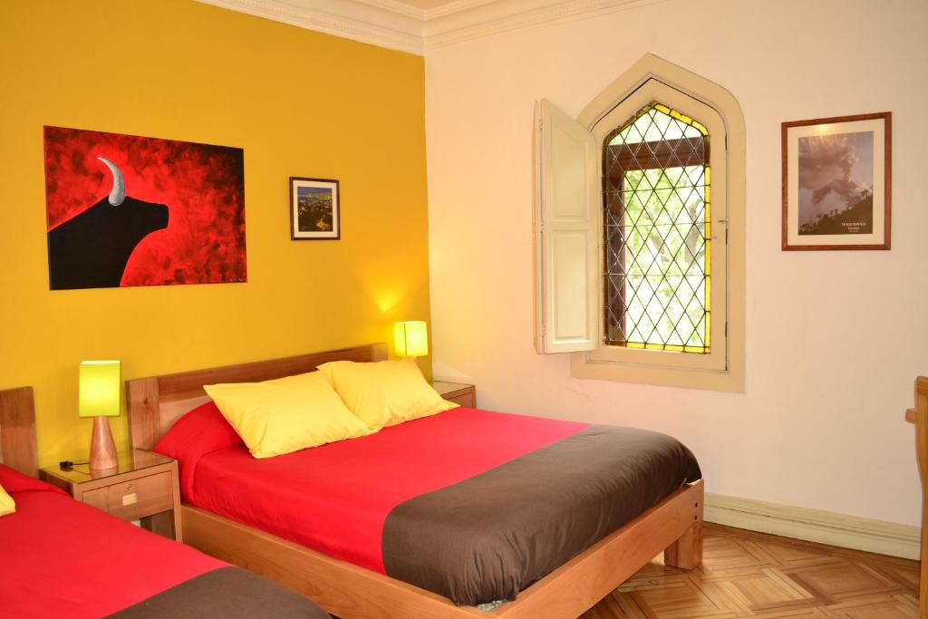 Postel nebo postele na pokoji v ubytování Hostal Rio Amazonas