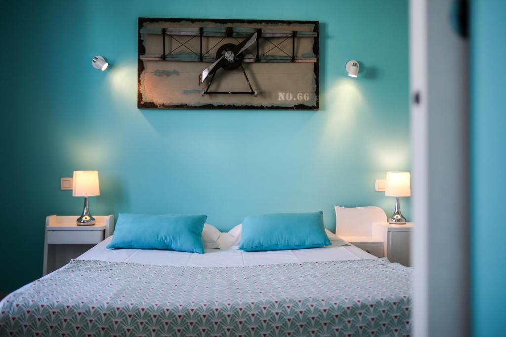 Postel nebo postele na pokoji v ubytování Hôtel La Bastide