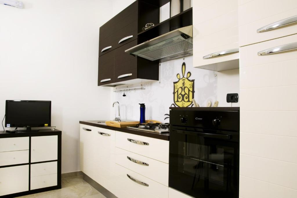 Kuchyň nebo kuchyňský kout v ubytování B&B Lepanto