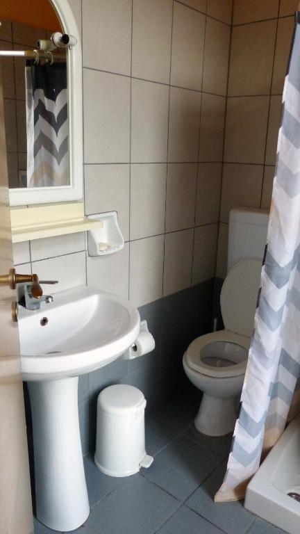 Koupelna v ubytování Kydonia Rooms