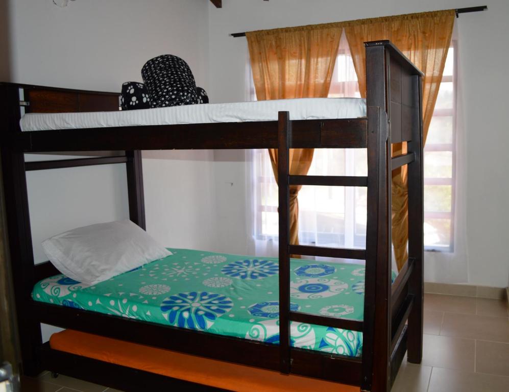 Postel nebo postele na pokoji v ubytování Balcones de la Casona