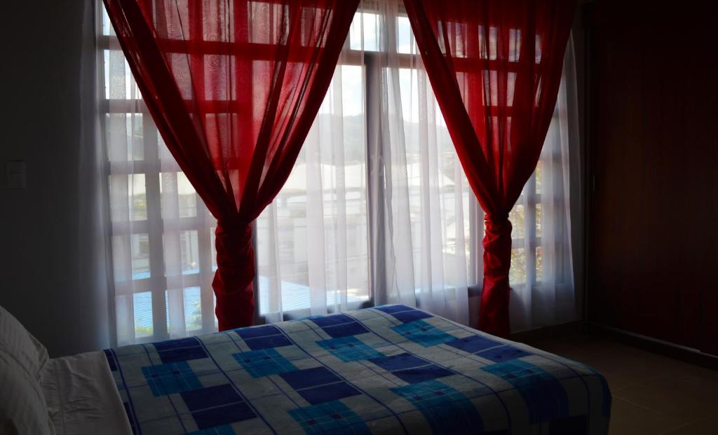 Postel nebo postele na pokoji v ubytování Balcones de la Casona