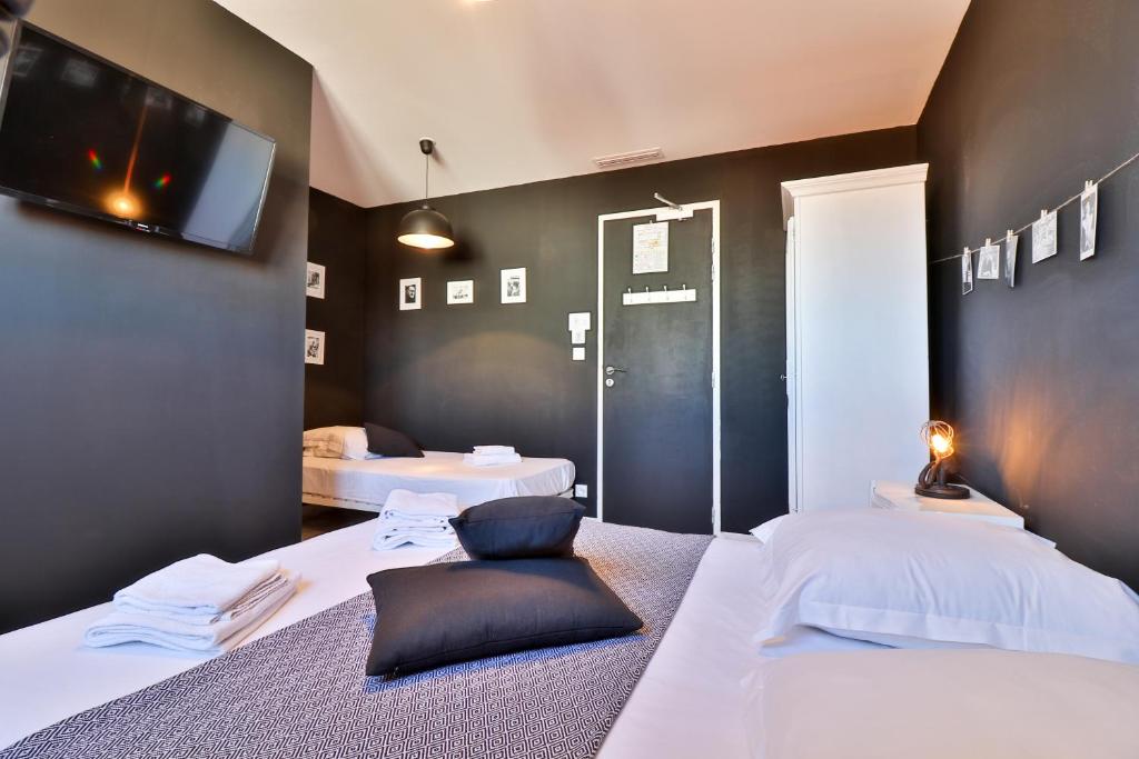 Postel nebo postele na pokoji v ubytování Hôtel La Bastide