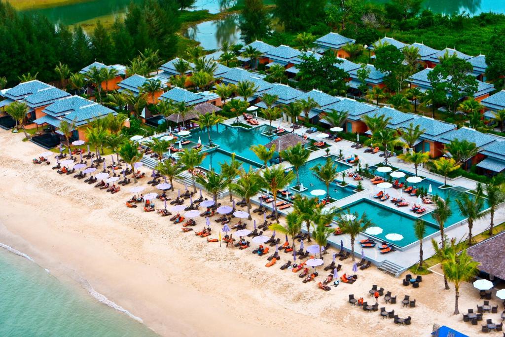 an aerial view of a resort on the beach at Beyond Resort Khaolak - SHA Plus in Khao Lak