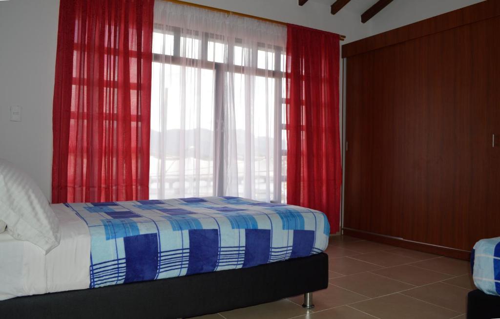 Postel nebo postele na pokoji v ubytování Balcones de la Casona