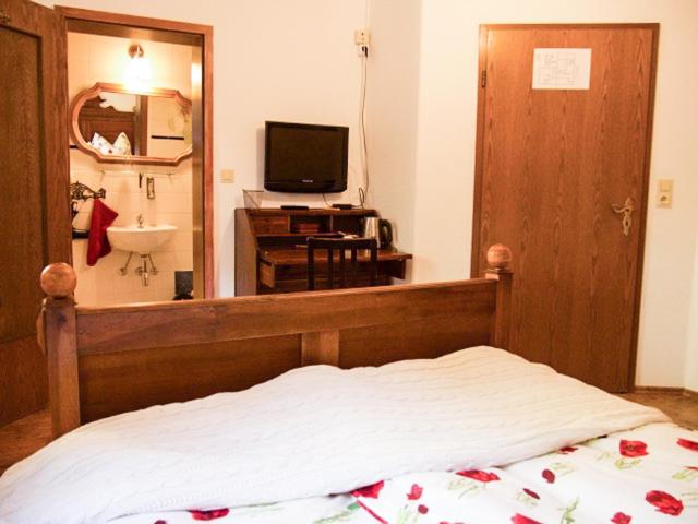 Postel nebo postele na pokoji v ubytování Hotel Feldmaus