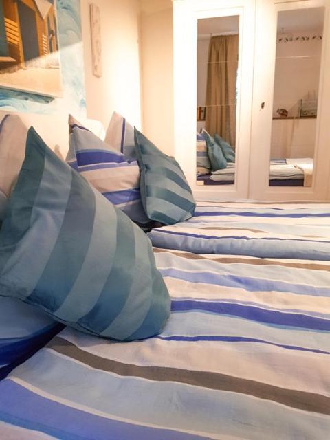 Postel nebo postele na pokoji v ubytování Hotel Feldmaus