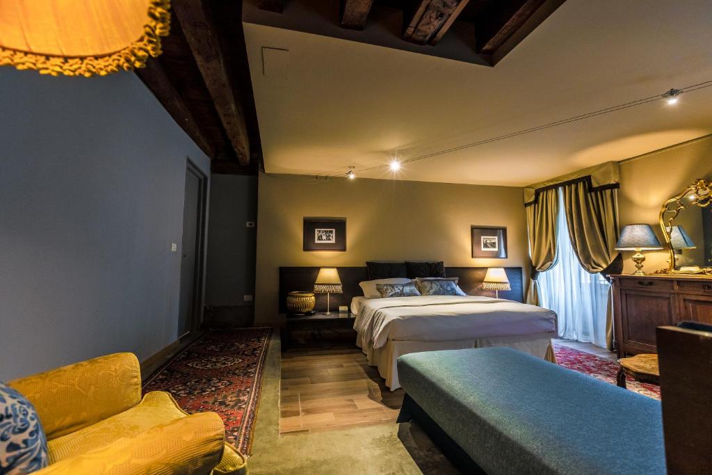 Postel nebo postele na pokoji v ubytování Avogaria 5 Rooms