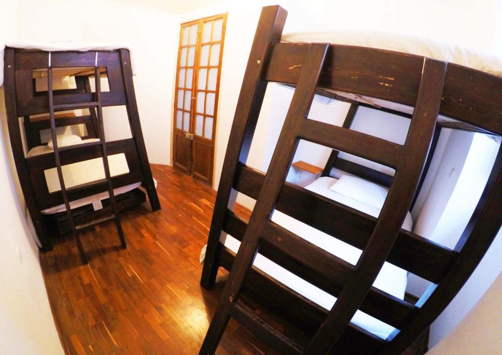 Postel nebo postele na pokoji v ubytování Arche Noah Boutique Hostel