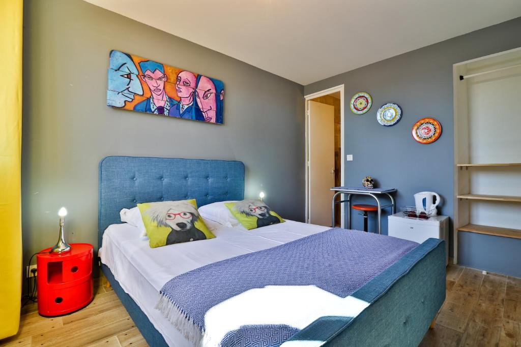Postel nebo postele na pokoji v ubytování Hôtel La Bastide
