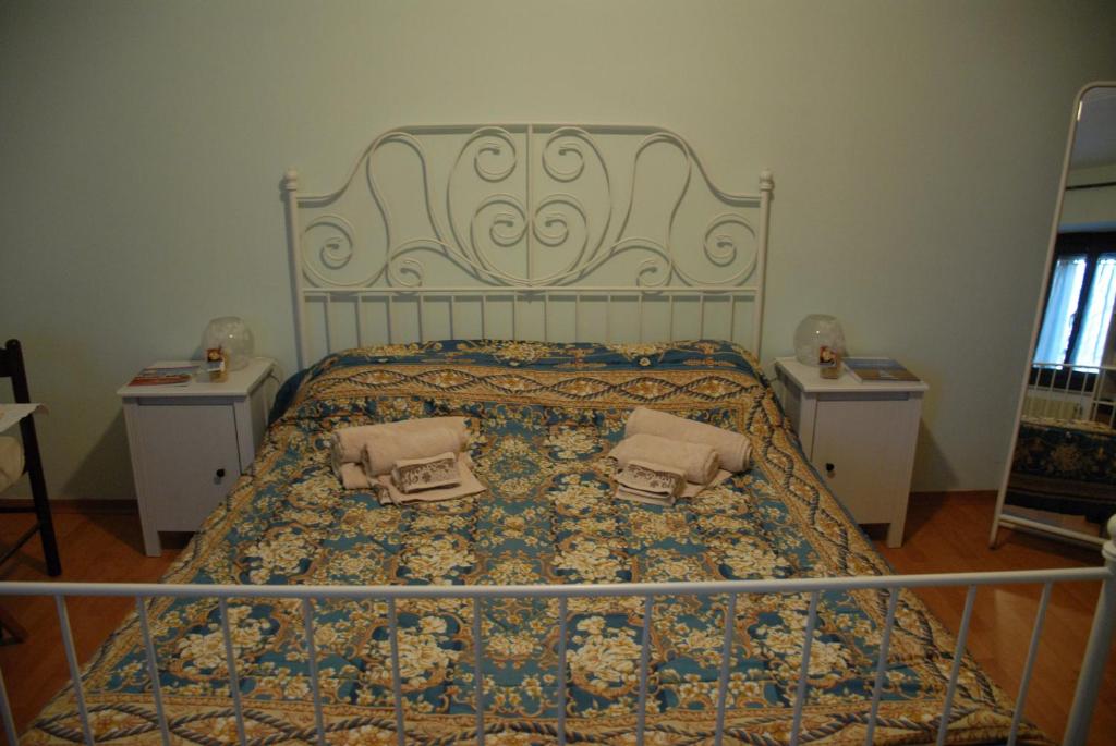 Postel nebo postele na pokoji v ubytování Fattoria Nonno Neno B&B
