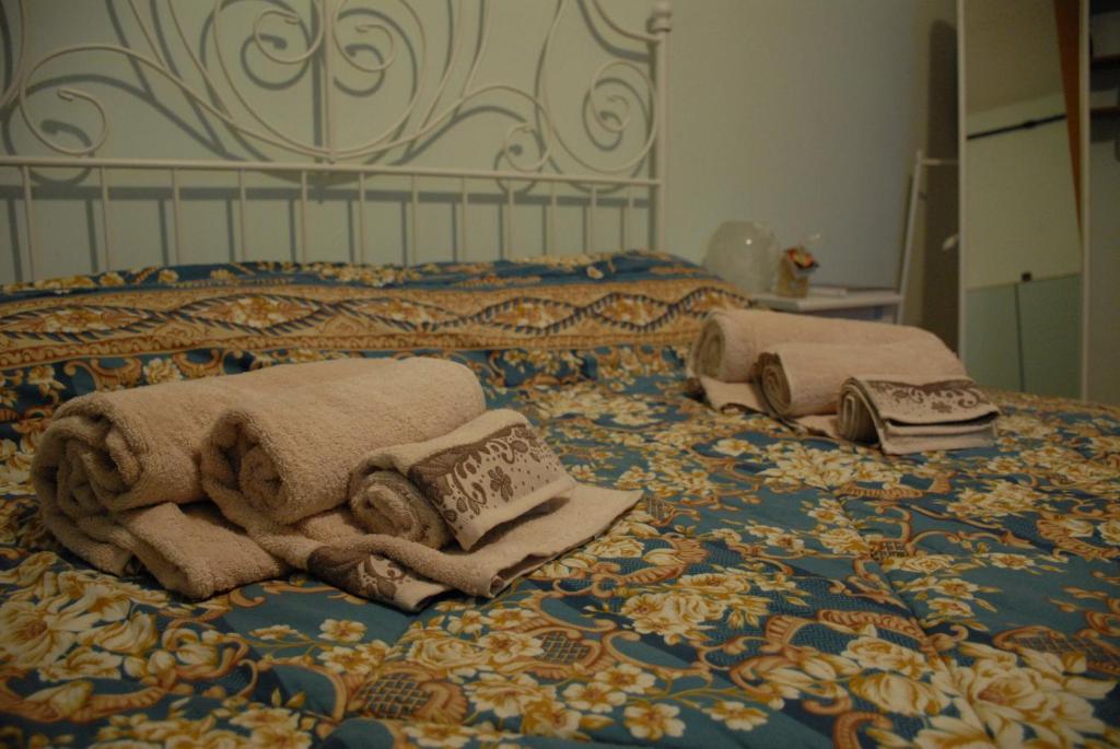 Postel nebo postele na pokoji v ubytování Fattoria Nonno Neno B&B