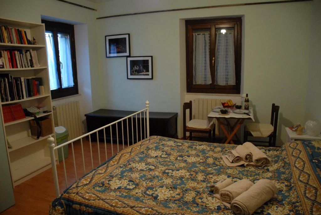 Postel nebo postele na pokoji v ubytování Fattoria Nonno Neno B&B