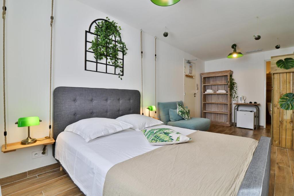 Postel nebo postele na pokoji v ubytování Hôtel La Bastide