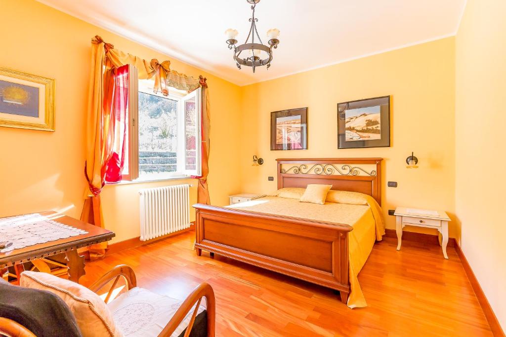 Łóżko lub łóżka w pokoju w obiekcie Tenuta Pian D'Attesio - Agriturismo
