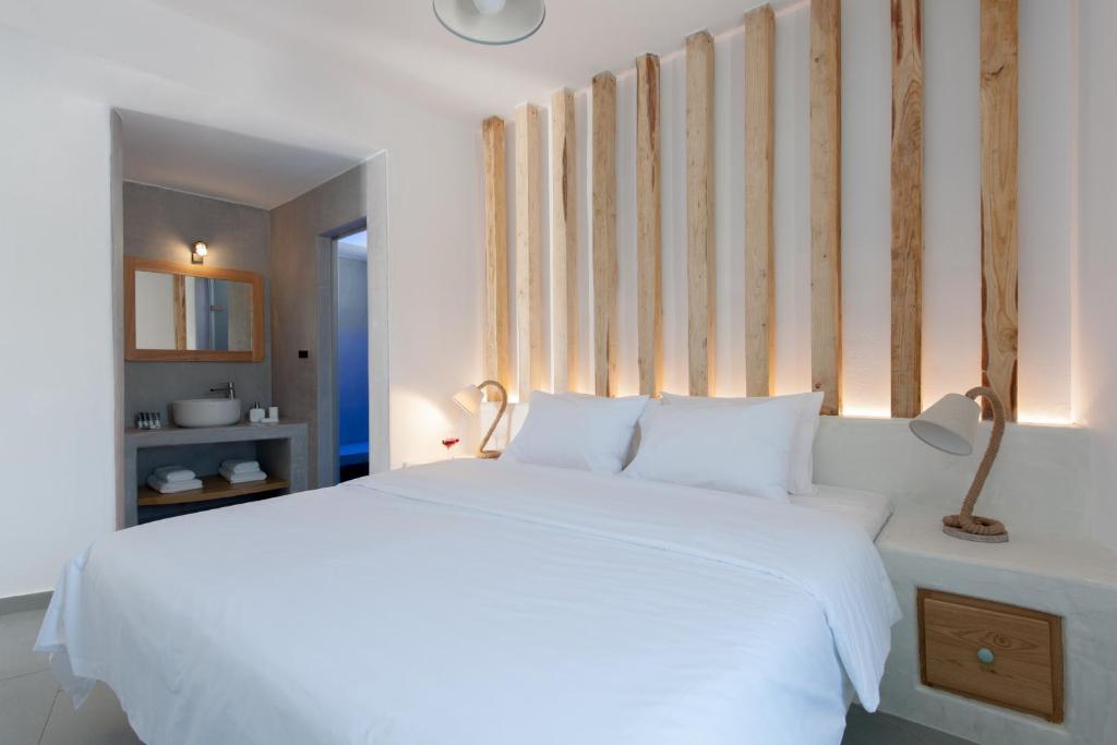 Letto o letti in una camera di Avatar Suites