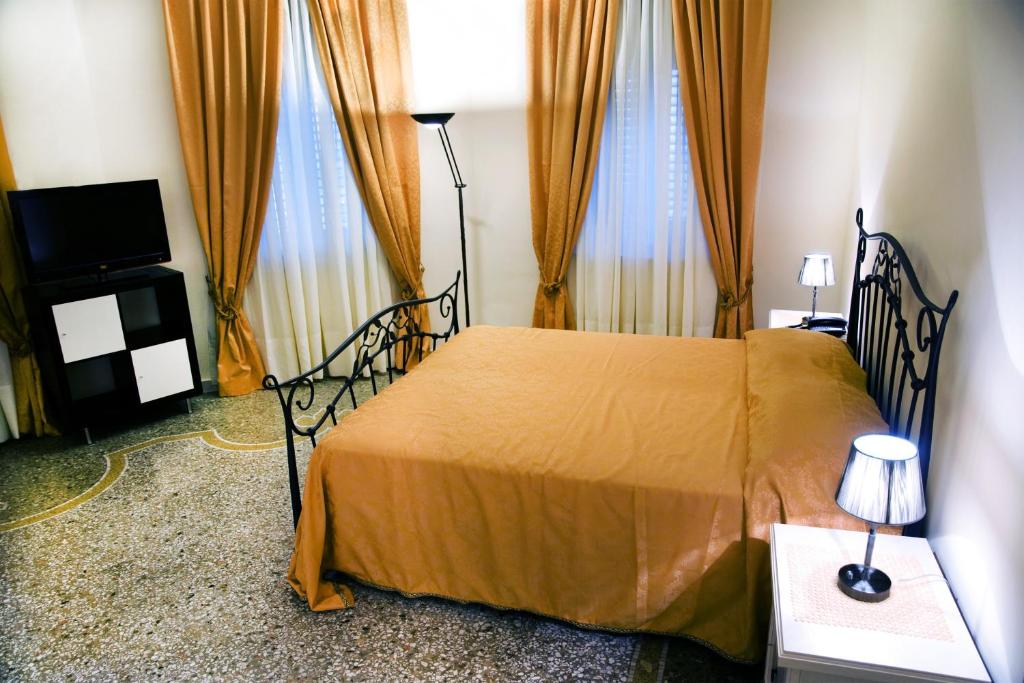 Postel nebo postele na pokoji v ubytování B&B Lepanto