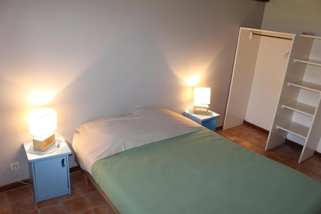 Postel nebo postele na pokoji v ubytování Gîte de Beausoleil